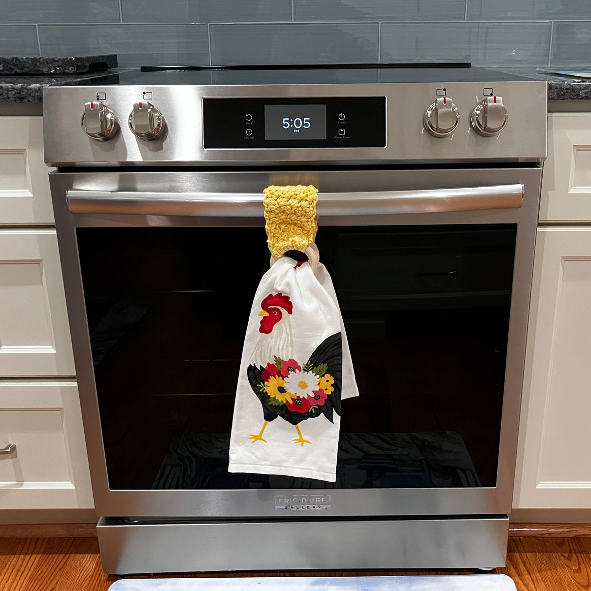 Buttercup and Curry Yelllow Towel Holder, Displayed on Oven